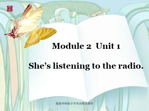 外研版一起小学英语二年级下册精品课件：Module 2《Unit 1 She’s listening to the radio》ppt课件3